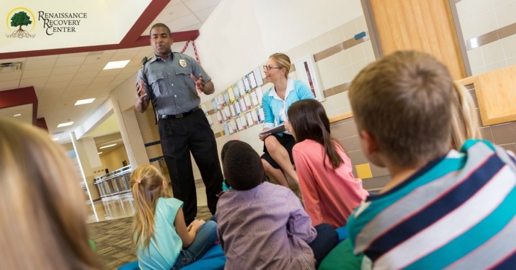 Dare Program Effectiveness- 3 Reasons Why DARE Program Failed Drug abuse resistance education (D.A.R.E.) Training By a Police Officer in a Classroom