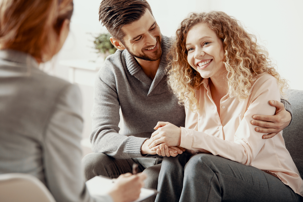 Happy,Smiling,Husband,And,Wife,During,Therapy,Session,With,A